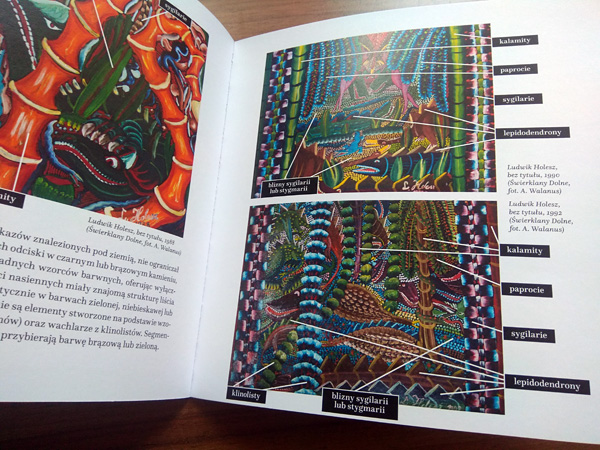 A book lying on the table, open to a page with reproductions of paintings. Frames with explanations next to the paintings